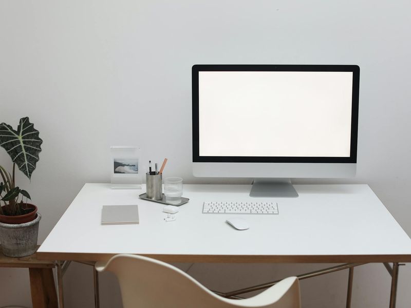 Spacious, well-lit room with minimal equipment for home workouts.